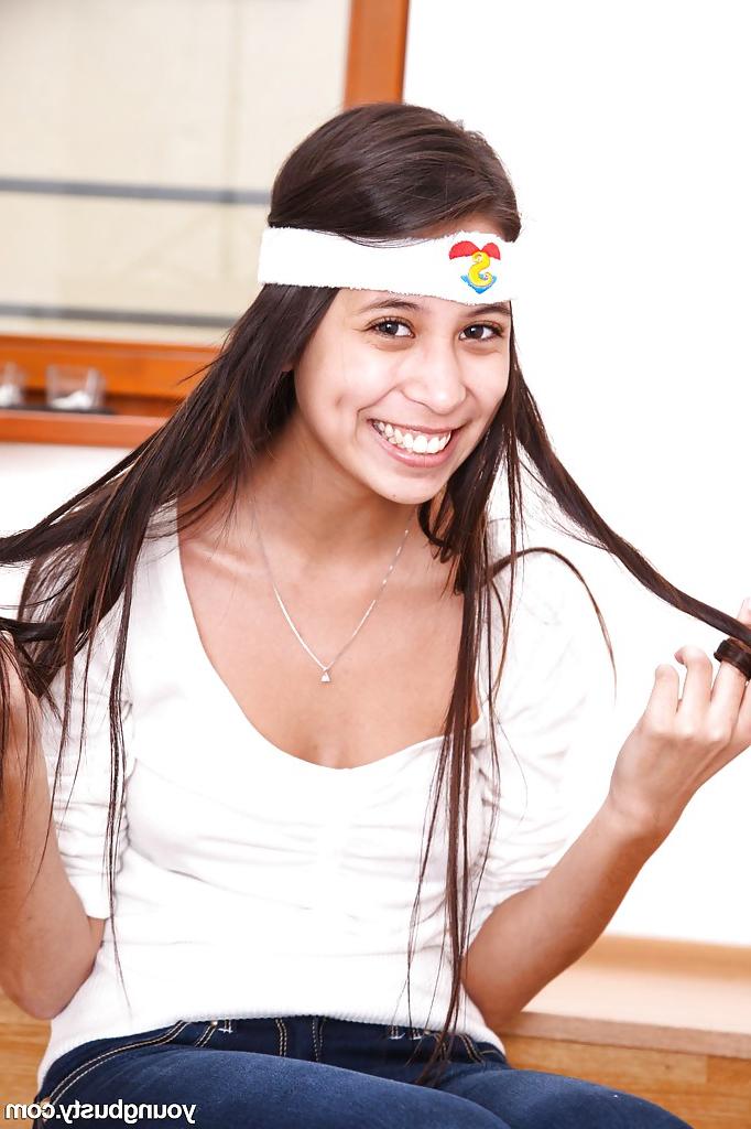 15P Busty European brunette teen babe Paula O removing jeans and panties