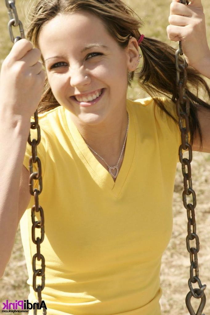 15P Andi Pink gets naked for you on a park swing