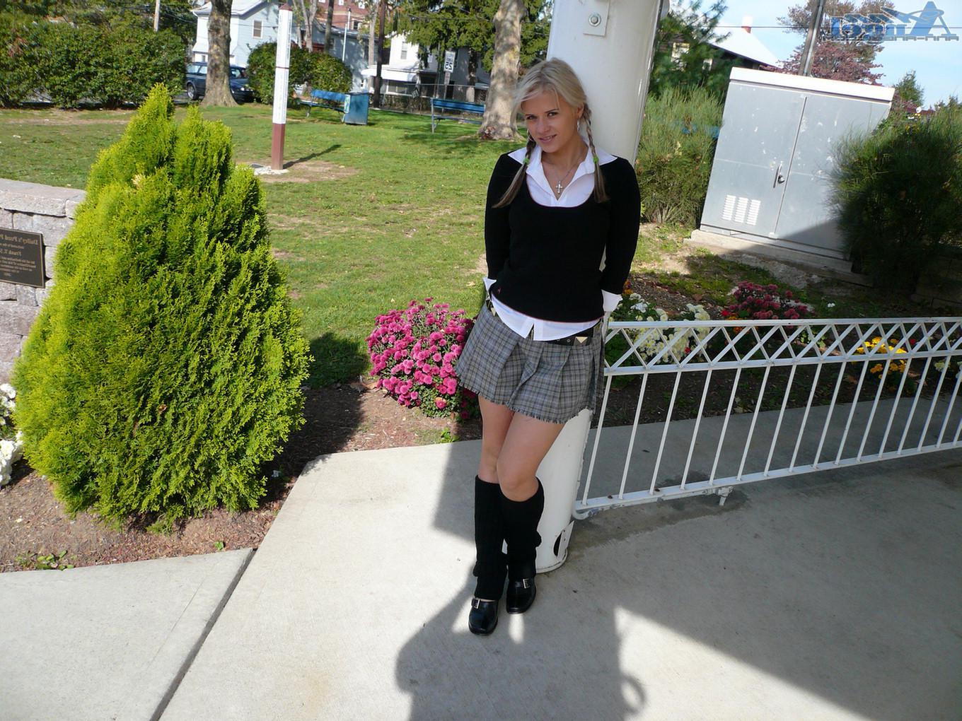 16P Ann Angel exposes her tits in a park