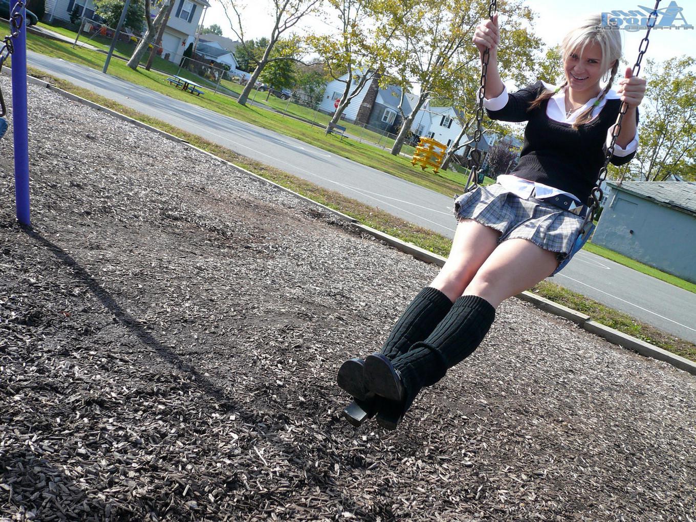 16P Ann Angel exposes her tits in a park