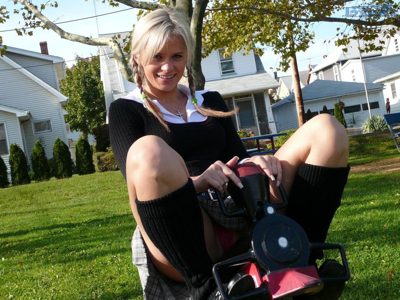 16P Ann Angel exposes her tits in a park
