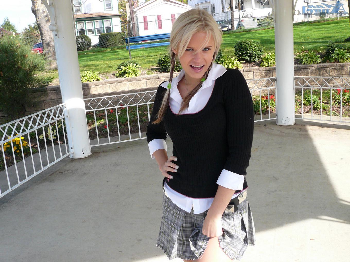16P Ann Angel exposes her tits in a park
