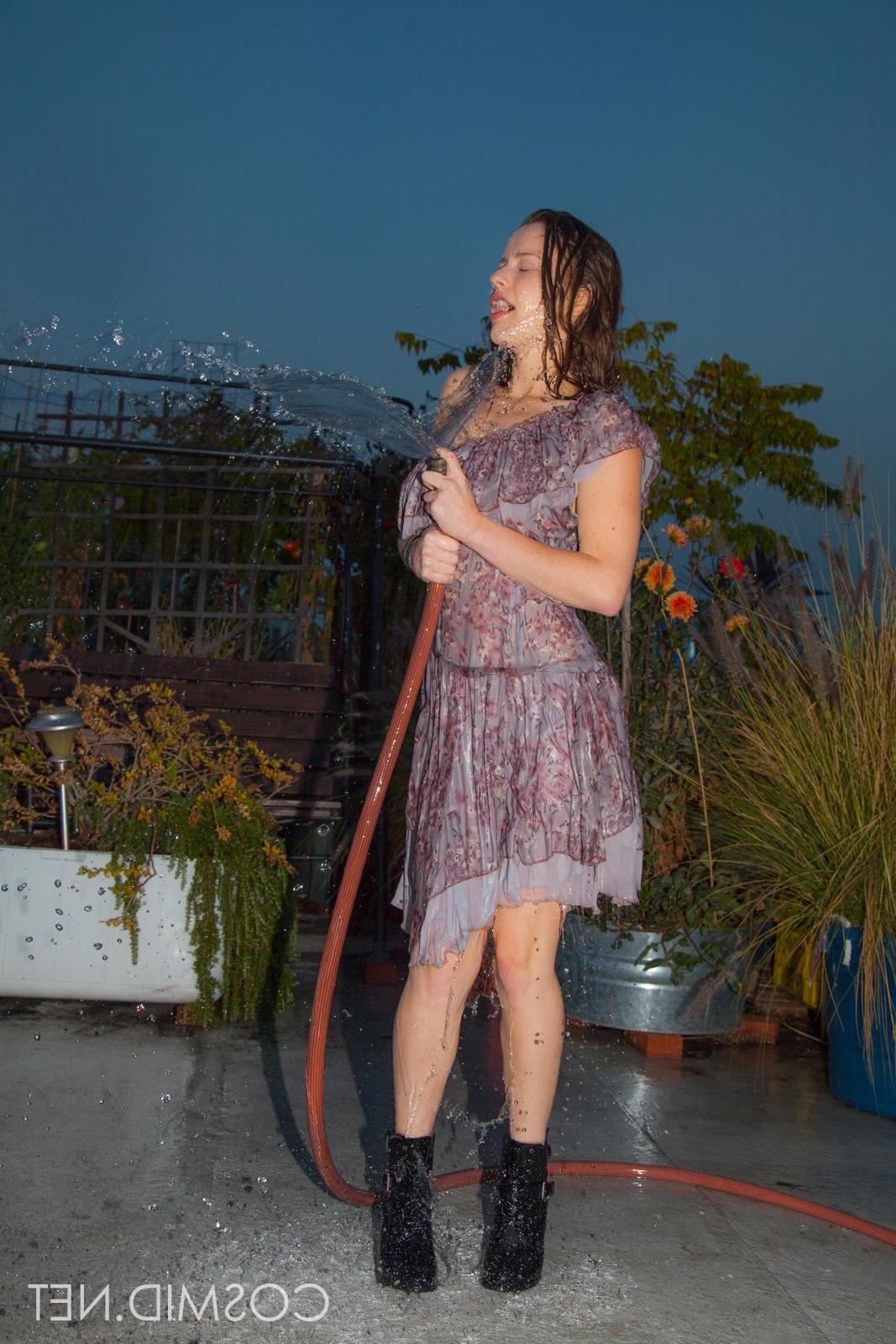 16P Busty brunette teen Avri has some naughty wet fun outside