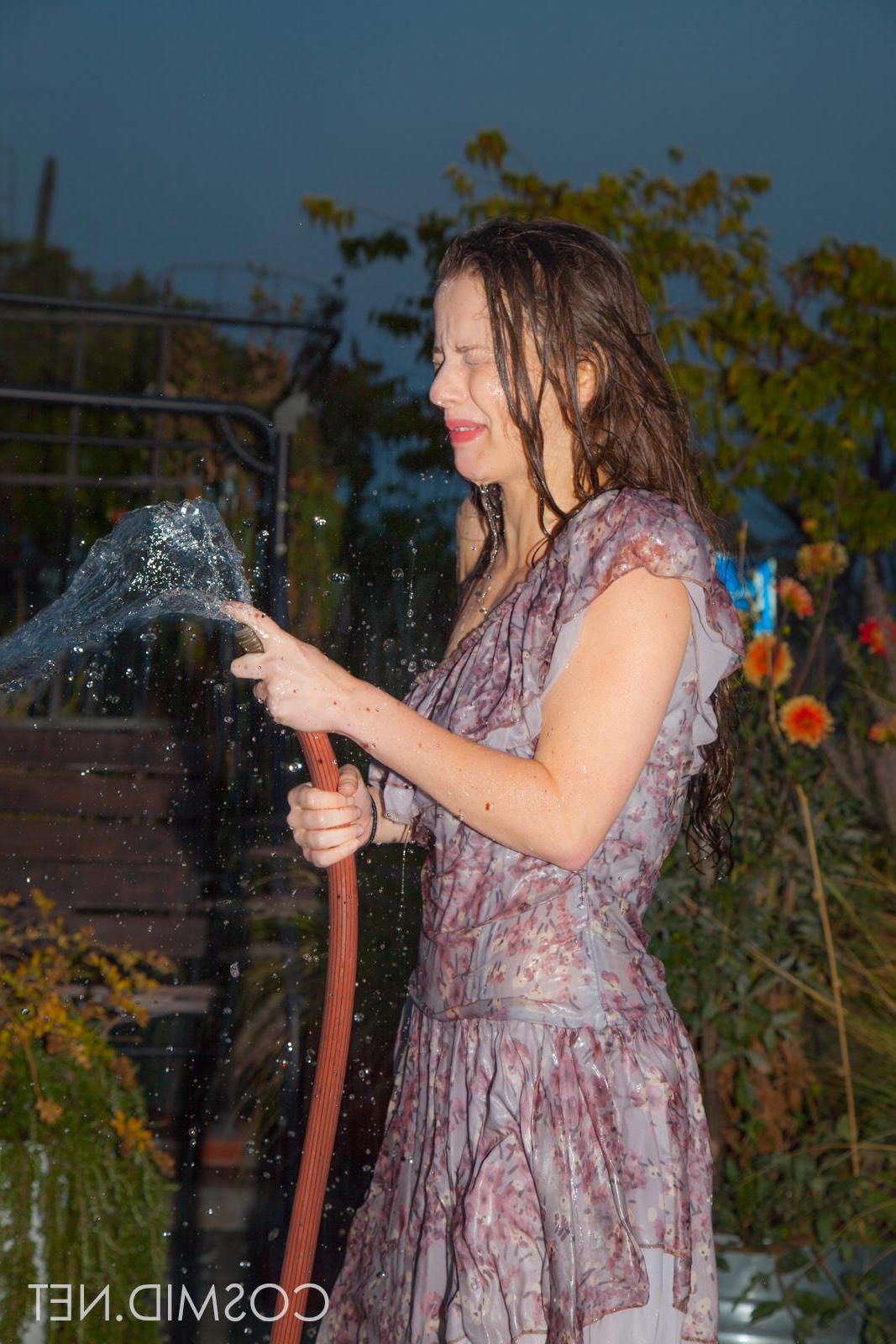 16P Busty brunette teen Avri has some naughty wet fun outside