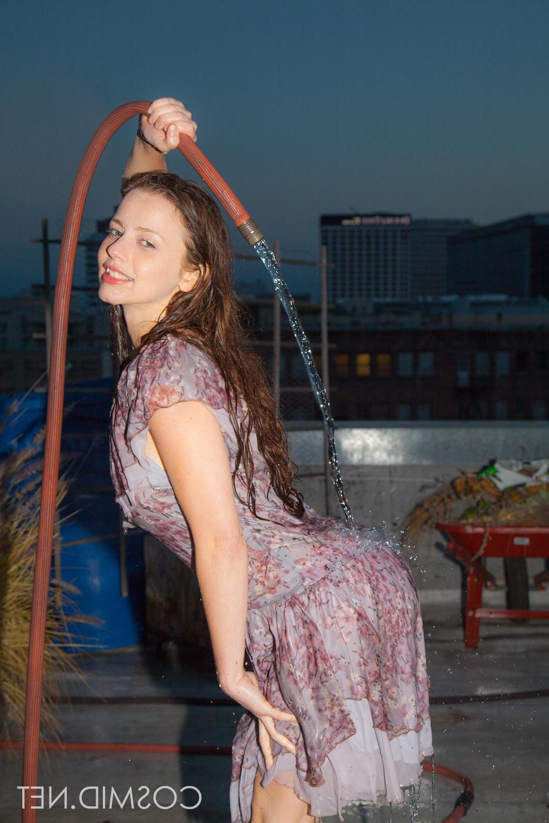 16P Busty brunette teen Avri has some naughty wet fun outside