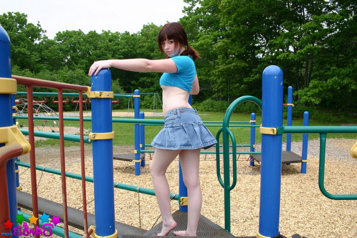 12P Cute tease Barbie shows off her perfect perky tits and tight round ass at the playground