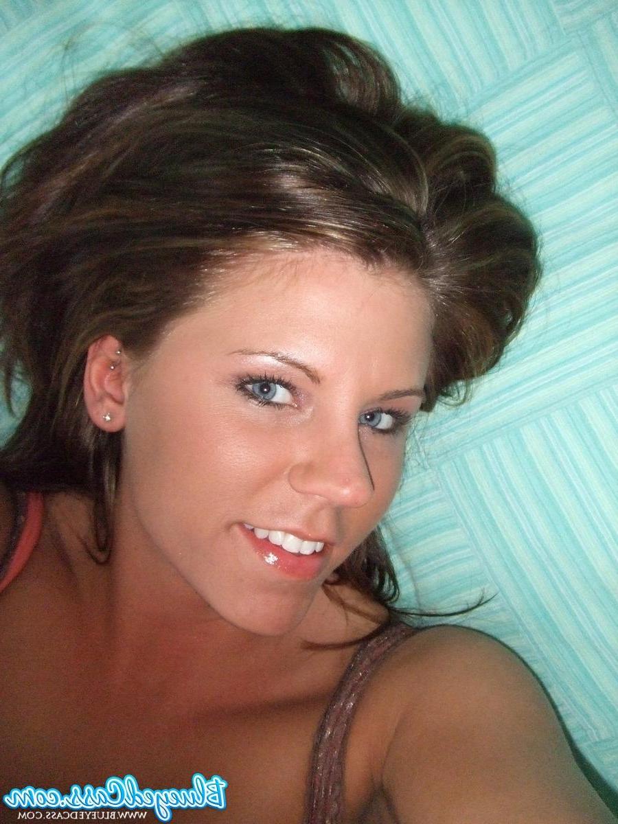 15P Pictures of teen model Blueyed Cass stripping to her panties in bed
