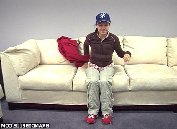 16P Pictures of teen model Brandi Belle stripping on the couch
