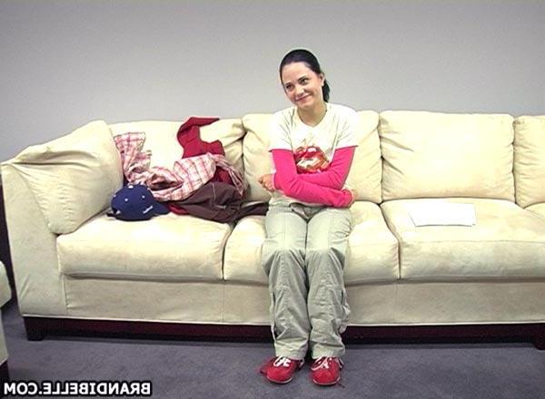 16P Pictures of teen model Brandi Belle stripping on the couch