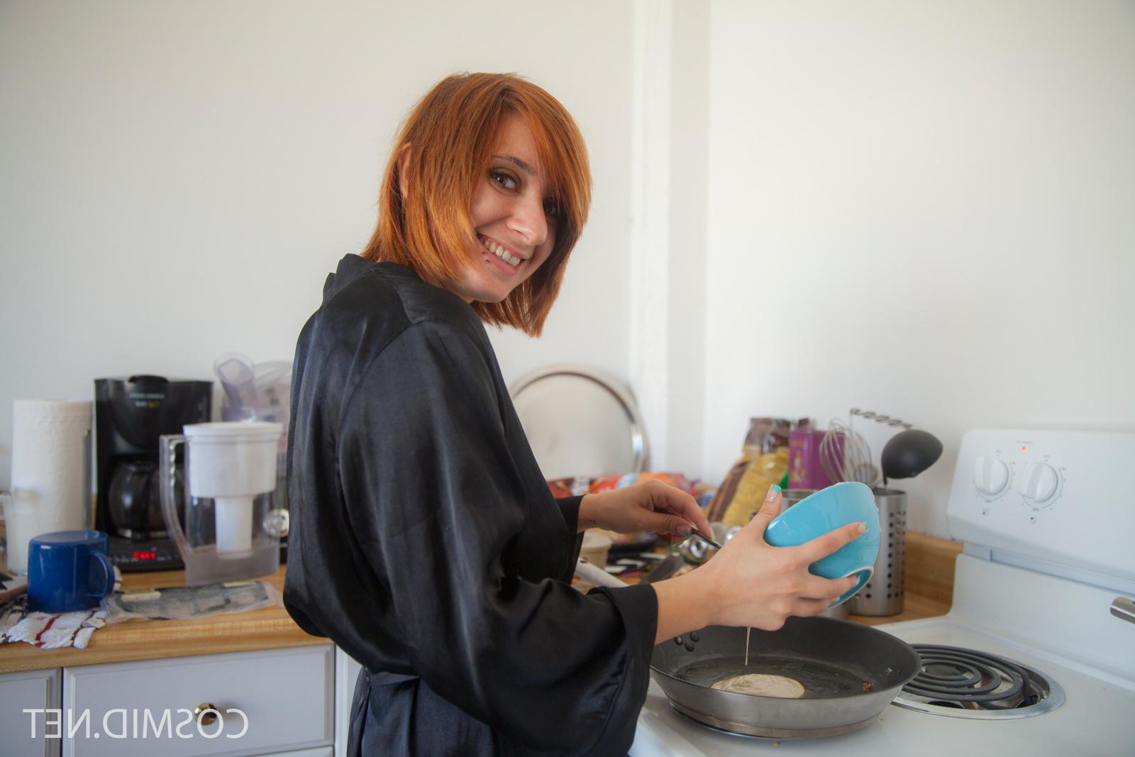 16P Busty redhead teen Chelsea Bell gets naked while making some eggs