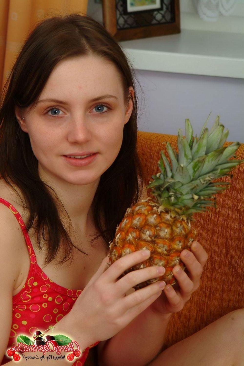 20P Pictures of teen cutie Cherry Caprice showing you her boobs