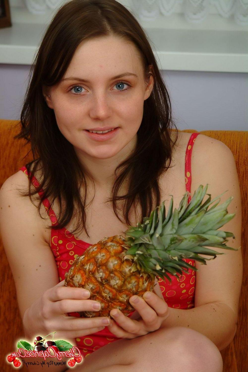 20P Pictures of teen cutie Cherry Caprice showing you her boobs