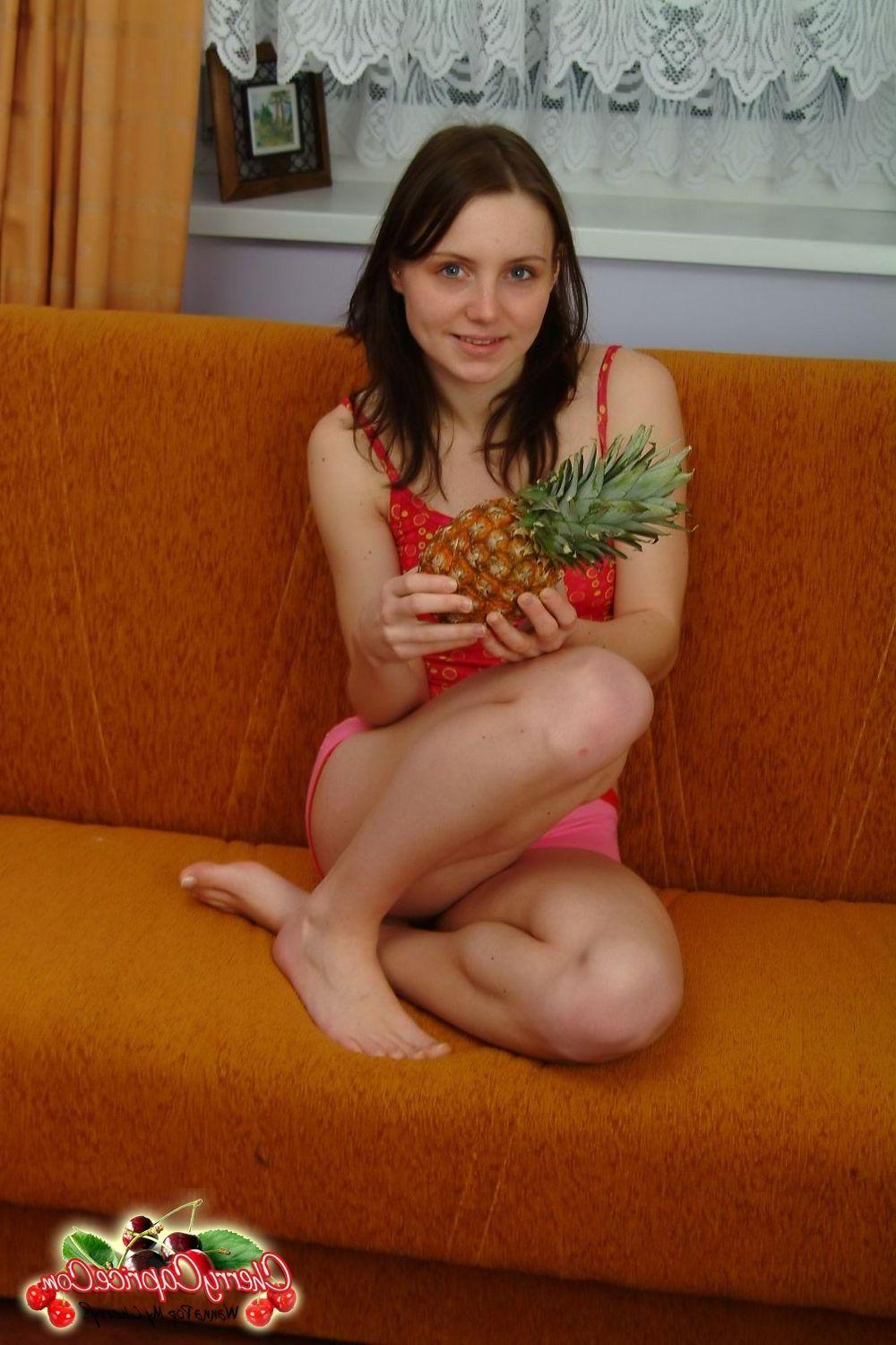 20P Pictures of teen cutie Cherry Caprice showing you her boobs