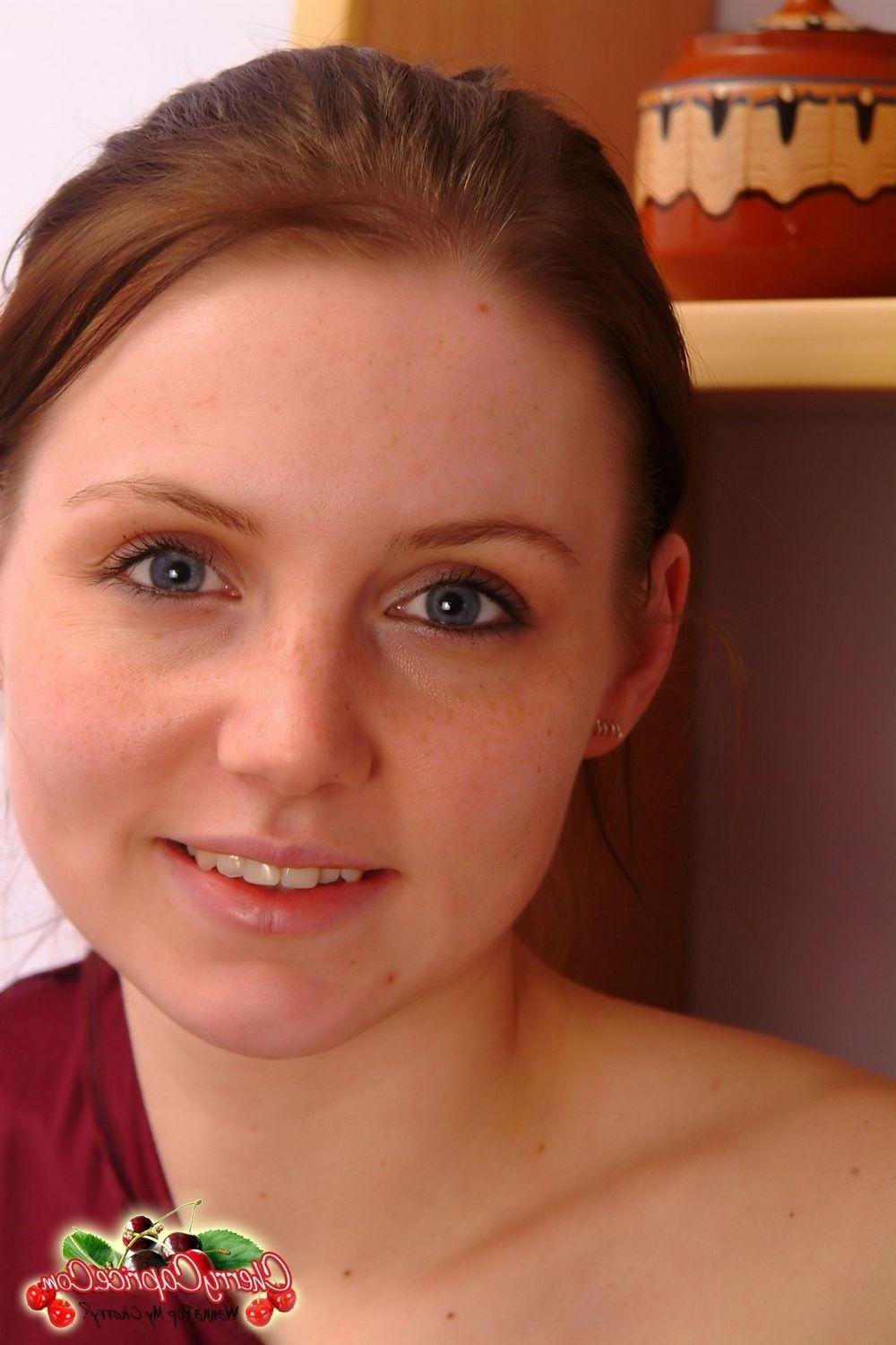20P Pictures of teen nympho Cherry Caprice stripping to her panties
