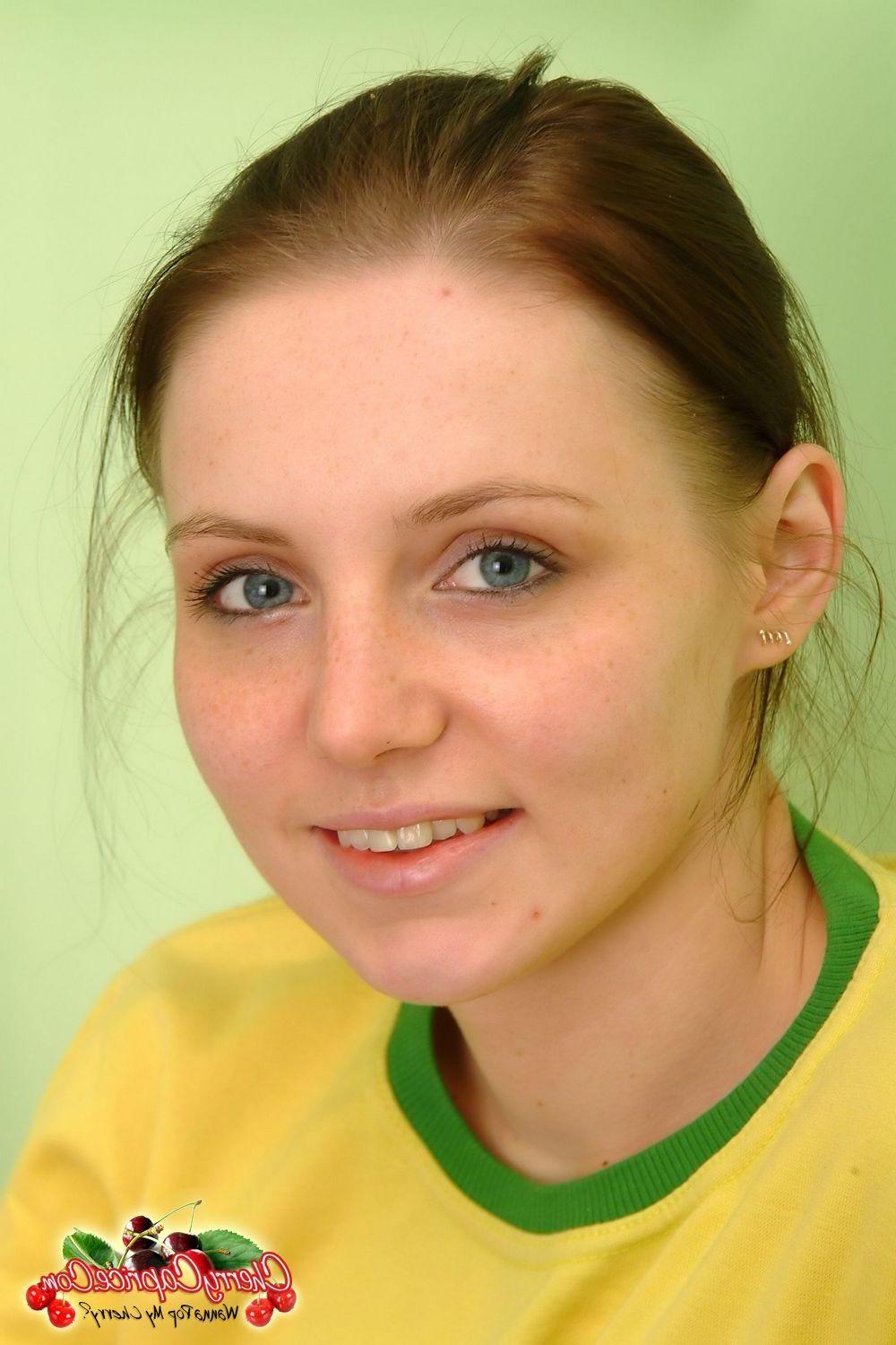 20P Pictures of teen girl Cherry Caprice getting naked for your pleasure