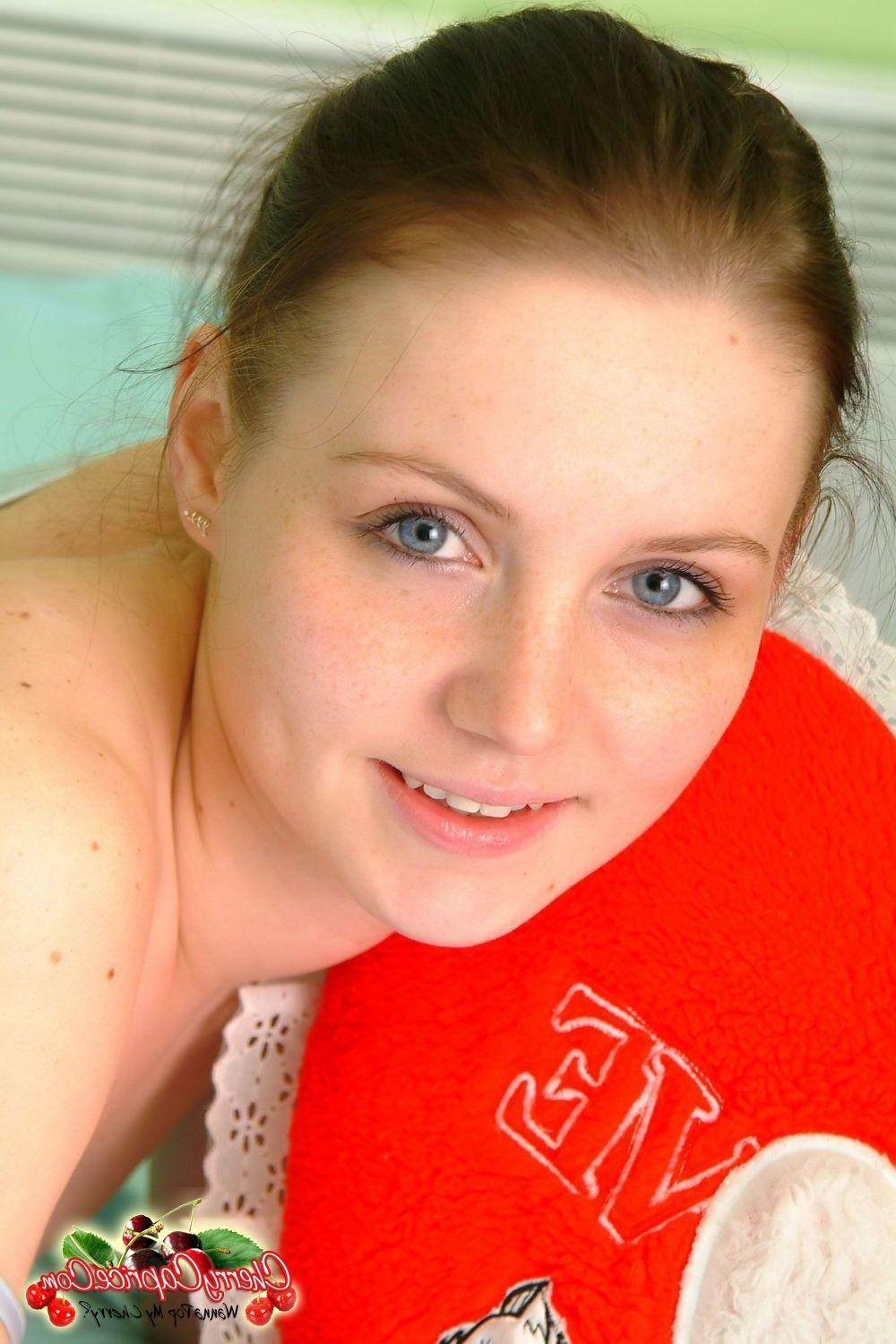 20P Pictures of teen star Cherry Caprice getting naked in bed