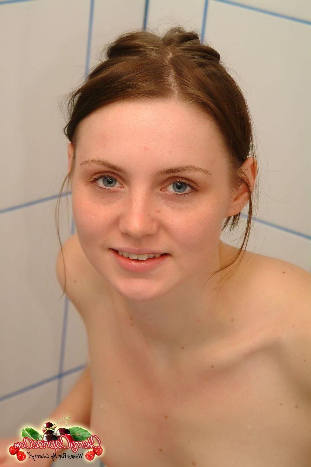 20P Pictures of teen chick Cherry Caprice getting all hot and wet for you