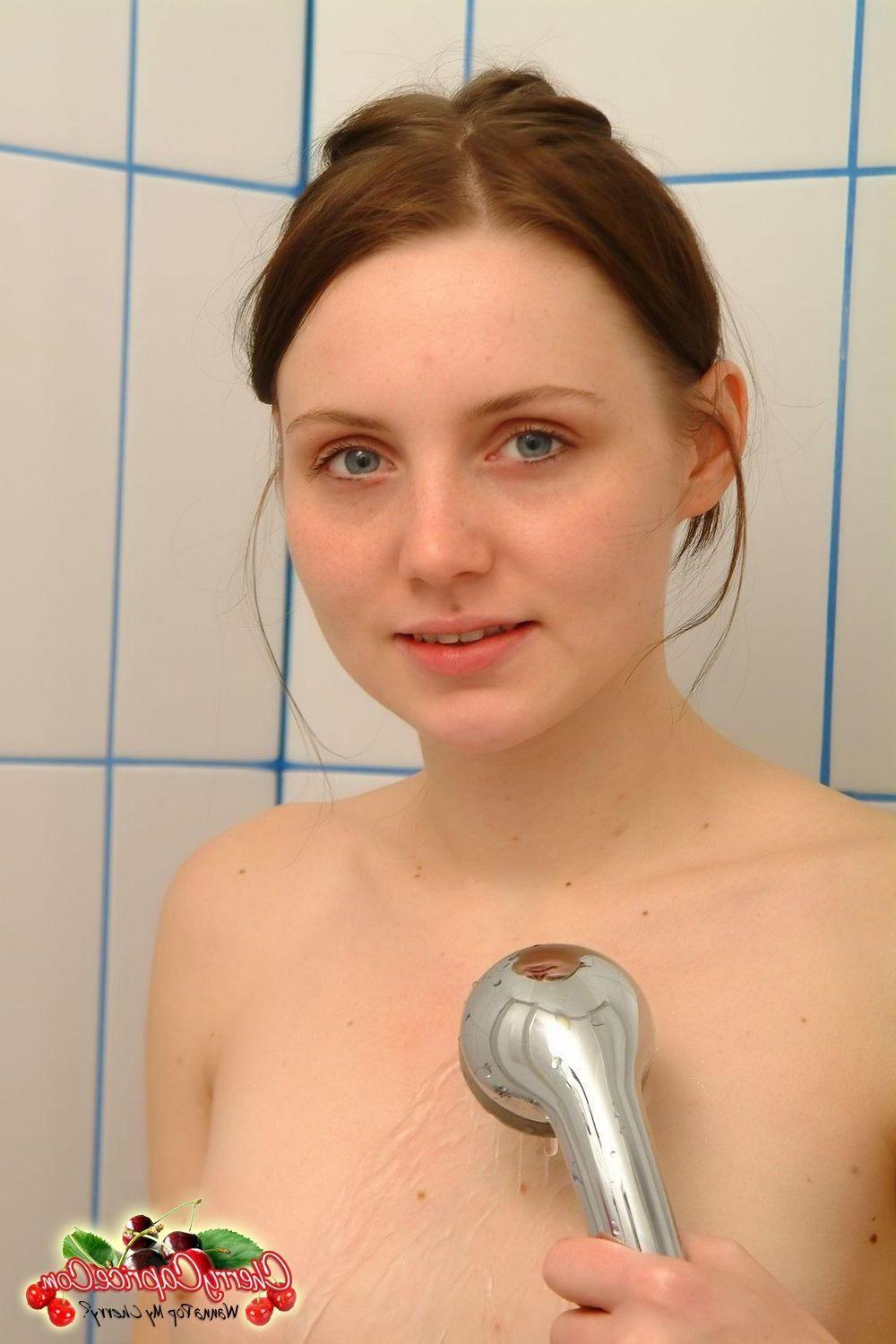 20P Pictures of teen chick Cherry Caprice getting all hot and wet for you