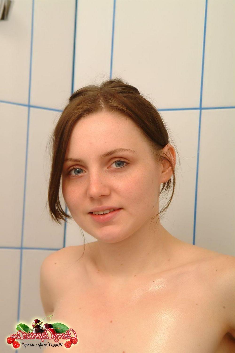 20P Pictures of teen chick Cherry Caprice getting all hot and wet for you