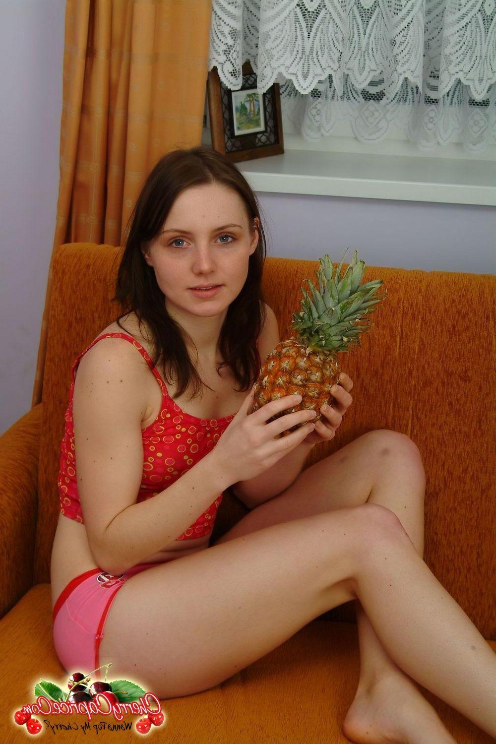 20P Pictures of teen Cherry Caprice getting intimate with a pineapple