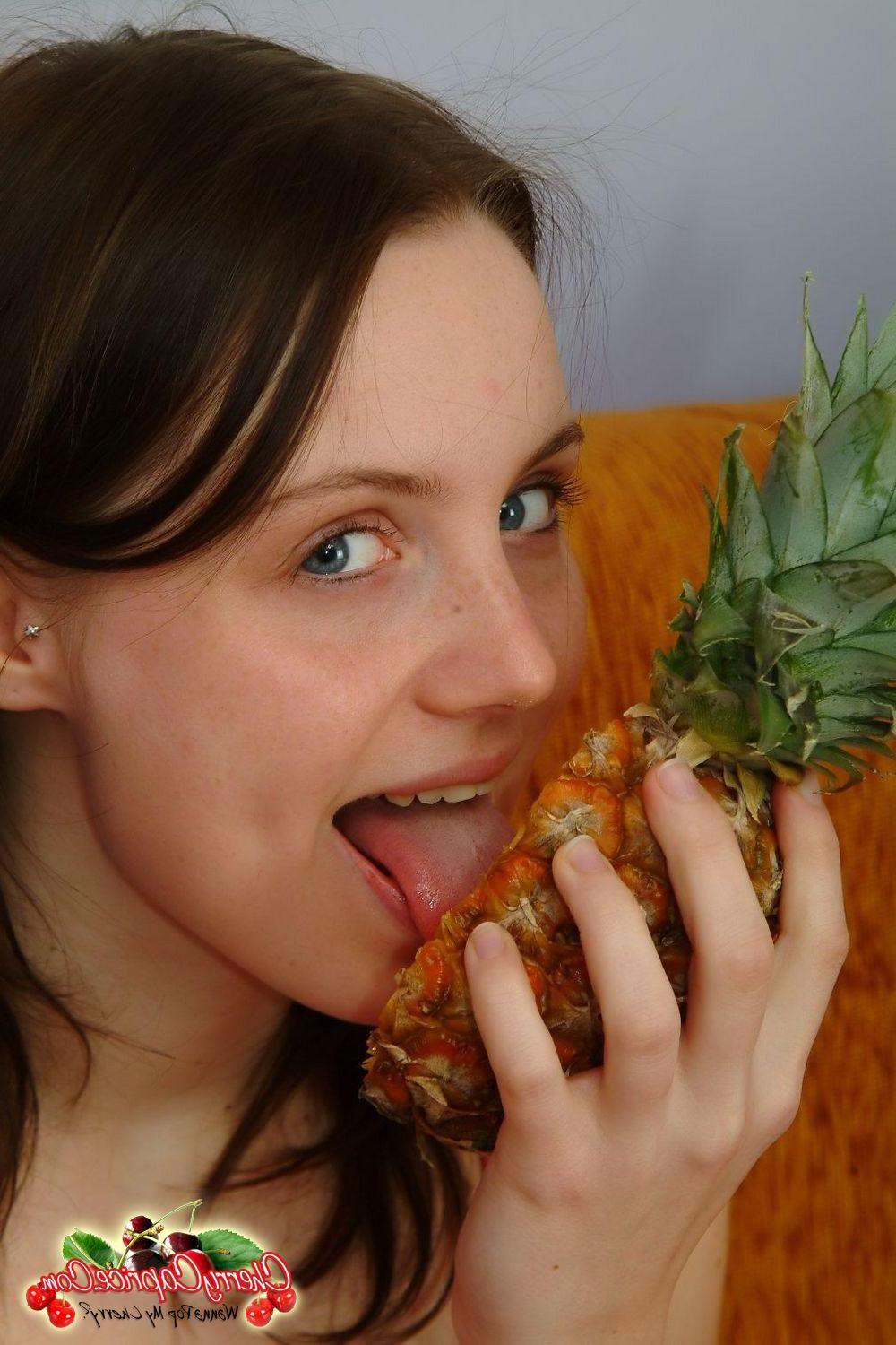 20P Pictures of teen Cherry Caprice getting intimate with a pineapple