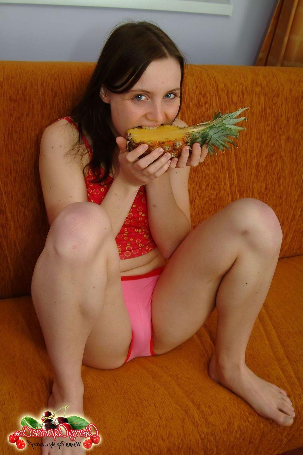 20P Pictures of teen Cherry Caprice getting intimate with a pineapple