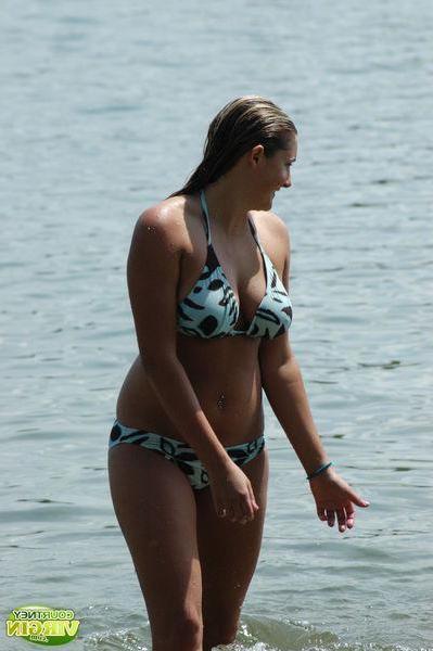16P Pictures of Courtney Virgin flashing from behind her bikini