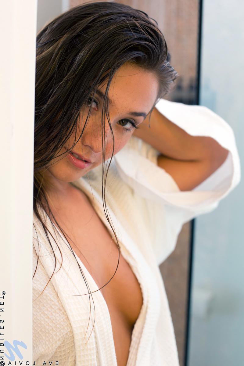 15P Eva Lovia washes her sweet shaved pussy in the shower