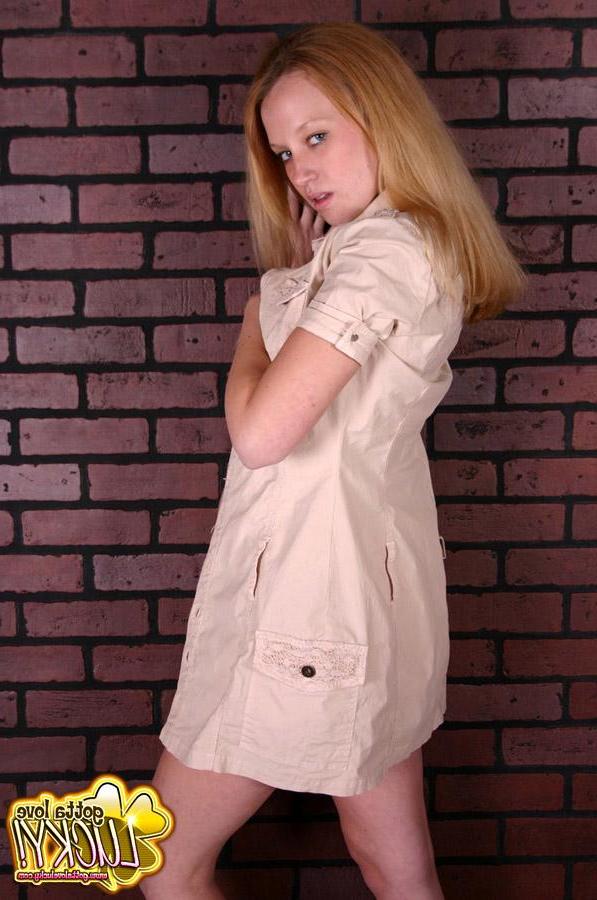 20P Pictures of Gotta Love Lucky in a trench coat