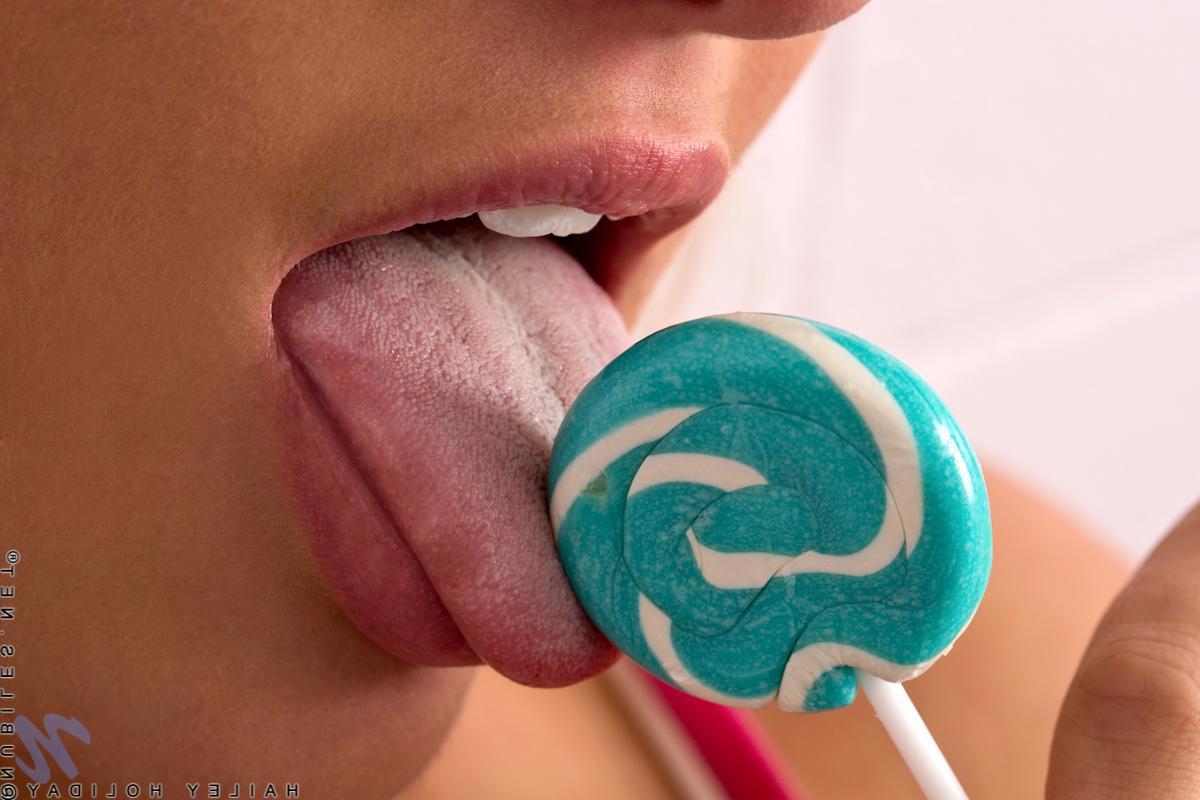 15P Sexy Hailey Holiday gets horny while she unveils her wet snatch