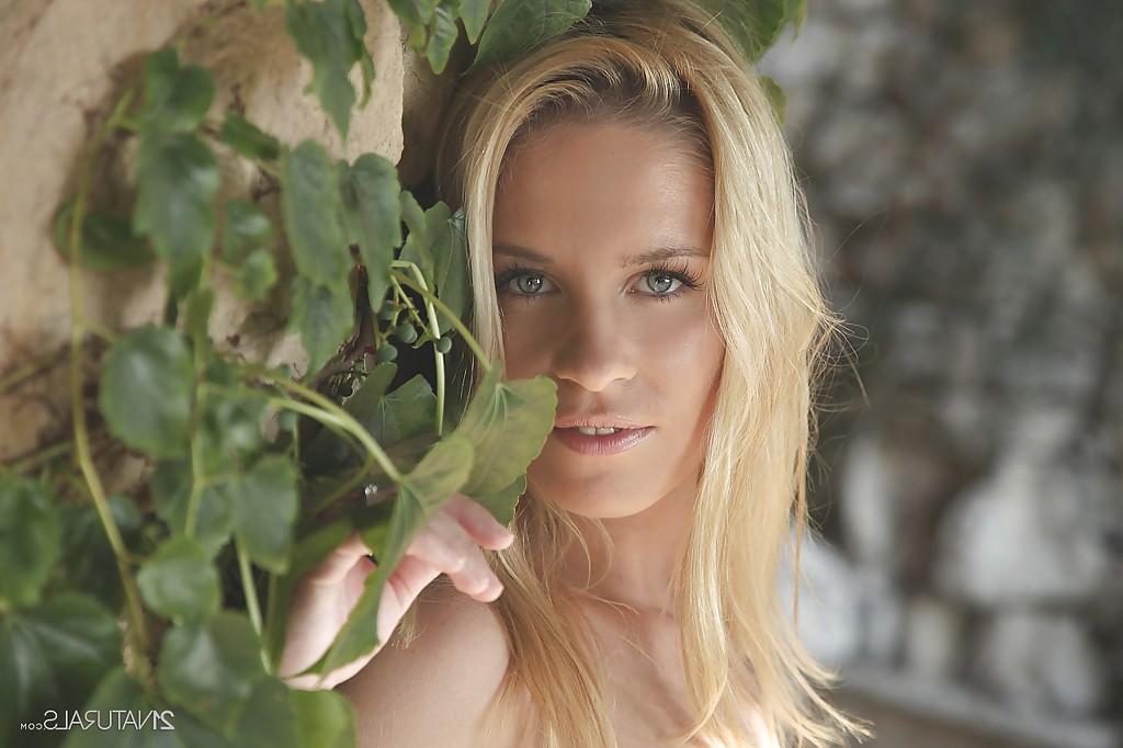 16P Calm and passionate pornstar babe Leony April is easy to look at