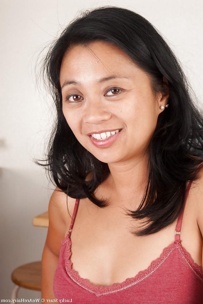 16P Sexy asian babe Lucky Starr showing off her tiny tits and hairy cunt