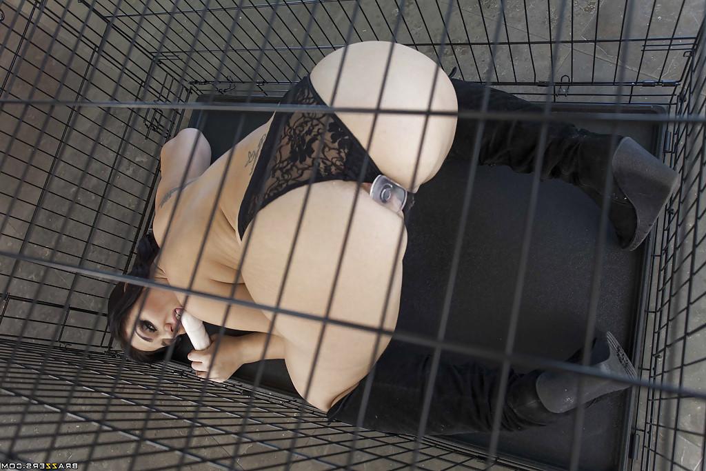 16P Enjoyable babe Madison Rose sits in cage and plays with sex toys