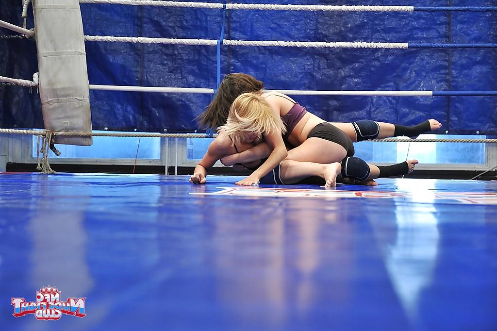 16P Well toned lesbians punching and caressing each other in the ring
