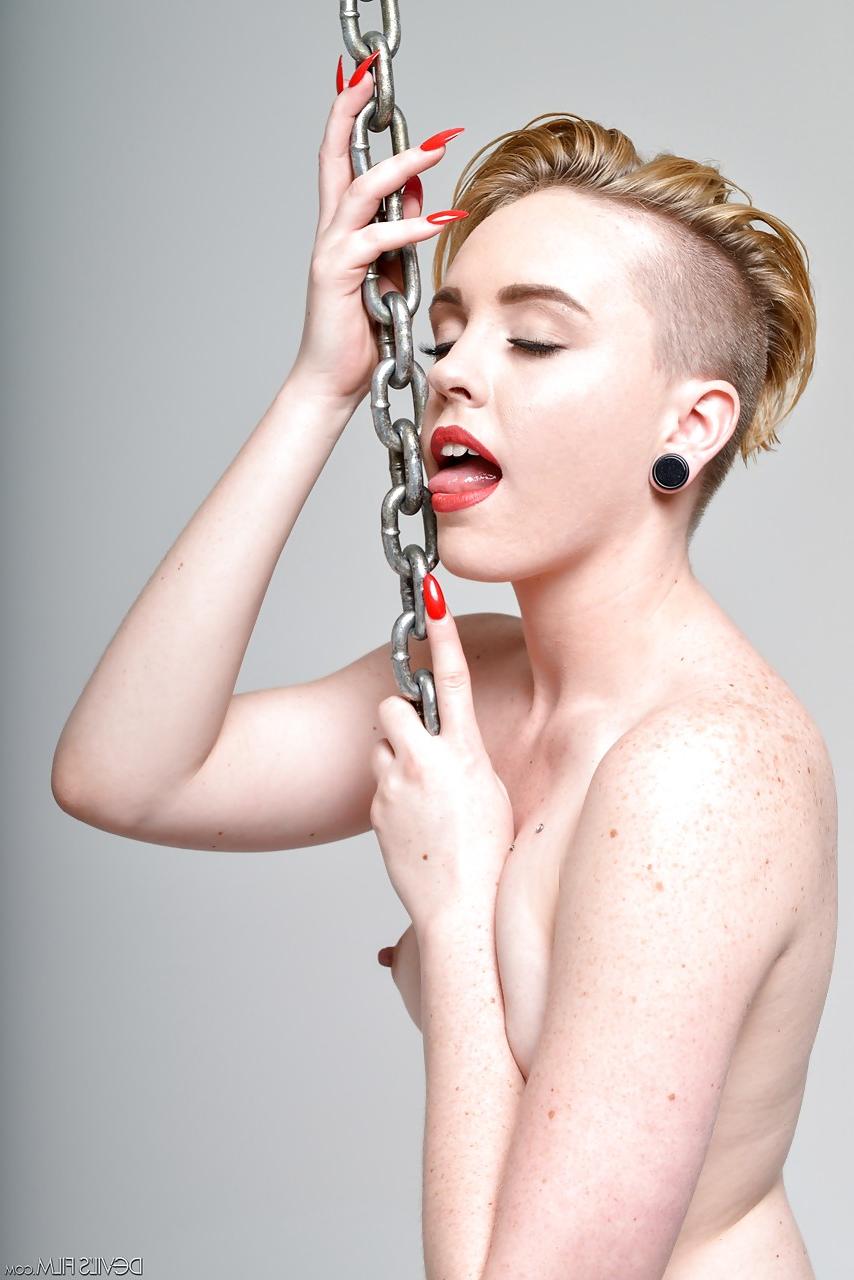 15P Seductive blonde doll with a cute ass Miley Mae rides a wrecking ball