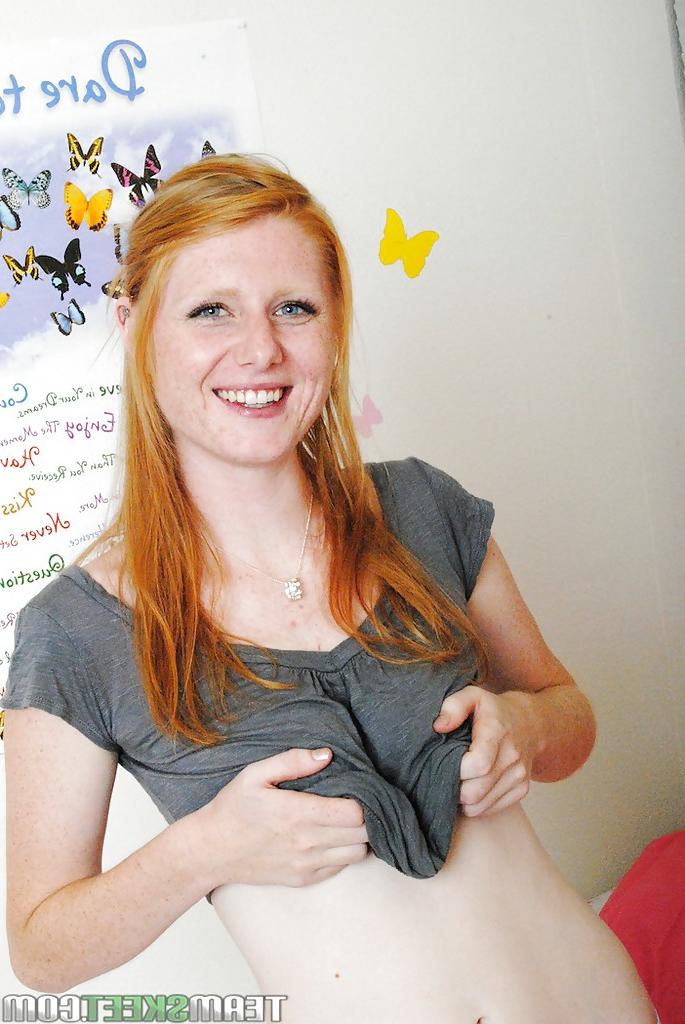 16P Naughty redhead amateur with shaved cunt stripping and playing with her toy