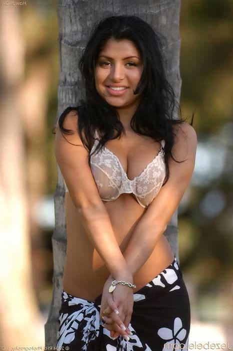 16P Jezebele poses in a public park