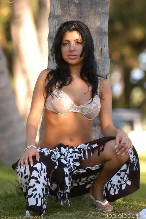 16P Jezebele poses in a public park