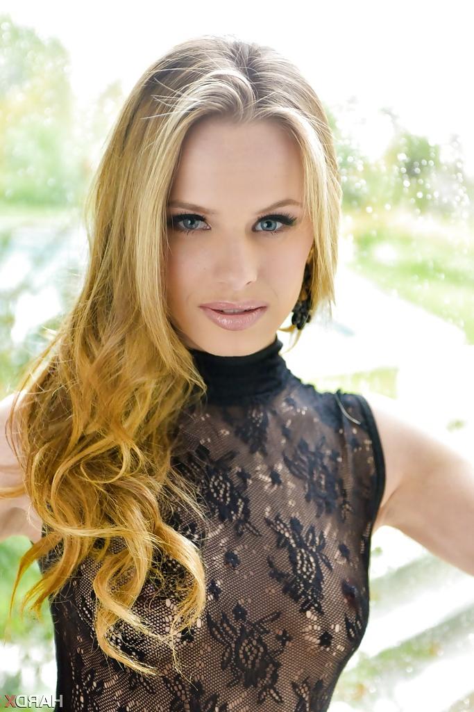 16P Blonde babe model Jillian Janson strutting outdoors in black bodystocking