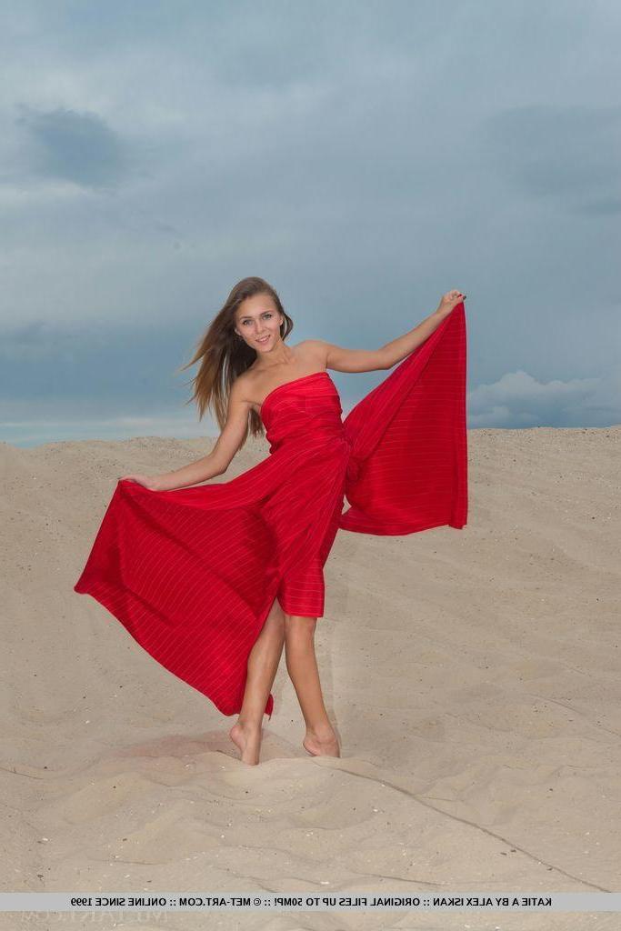 18P Beautiful blonde Katie A shows you her tight pussy on the sand dunes