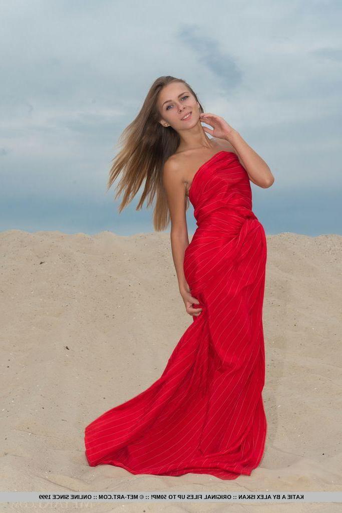 18P Beautiful blonde Katie A shows you her tight pussy on the sand dunes