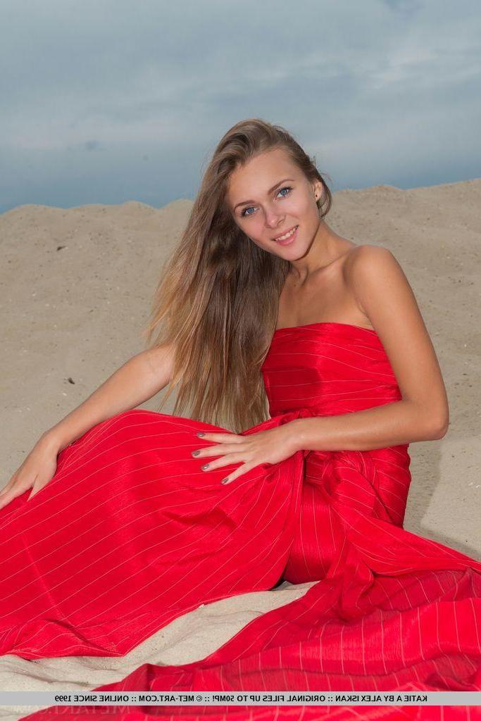 18P Beautiful blonde Katie A shows you her tight pussy on the sand dunes