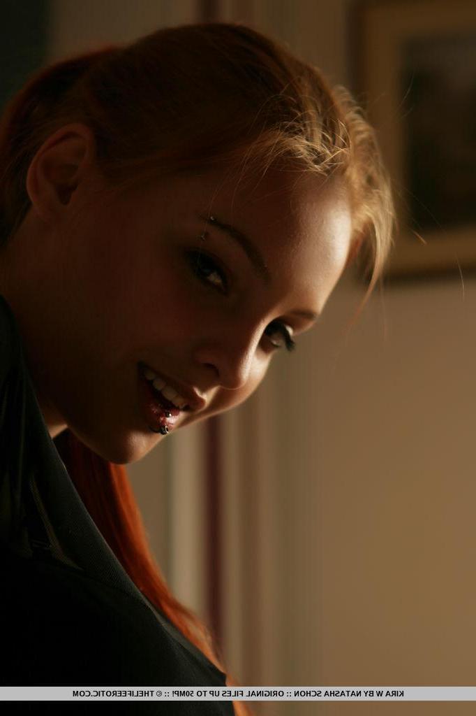 16P Redhead model Kira W gets horny while cleaning the house