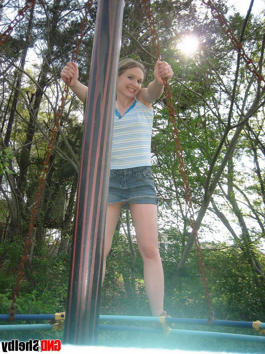 12P Perky girl next door Shelby shows off her perfect teenage breasts in the park on the jungle gym