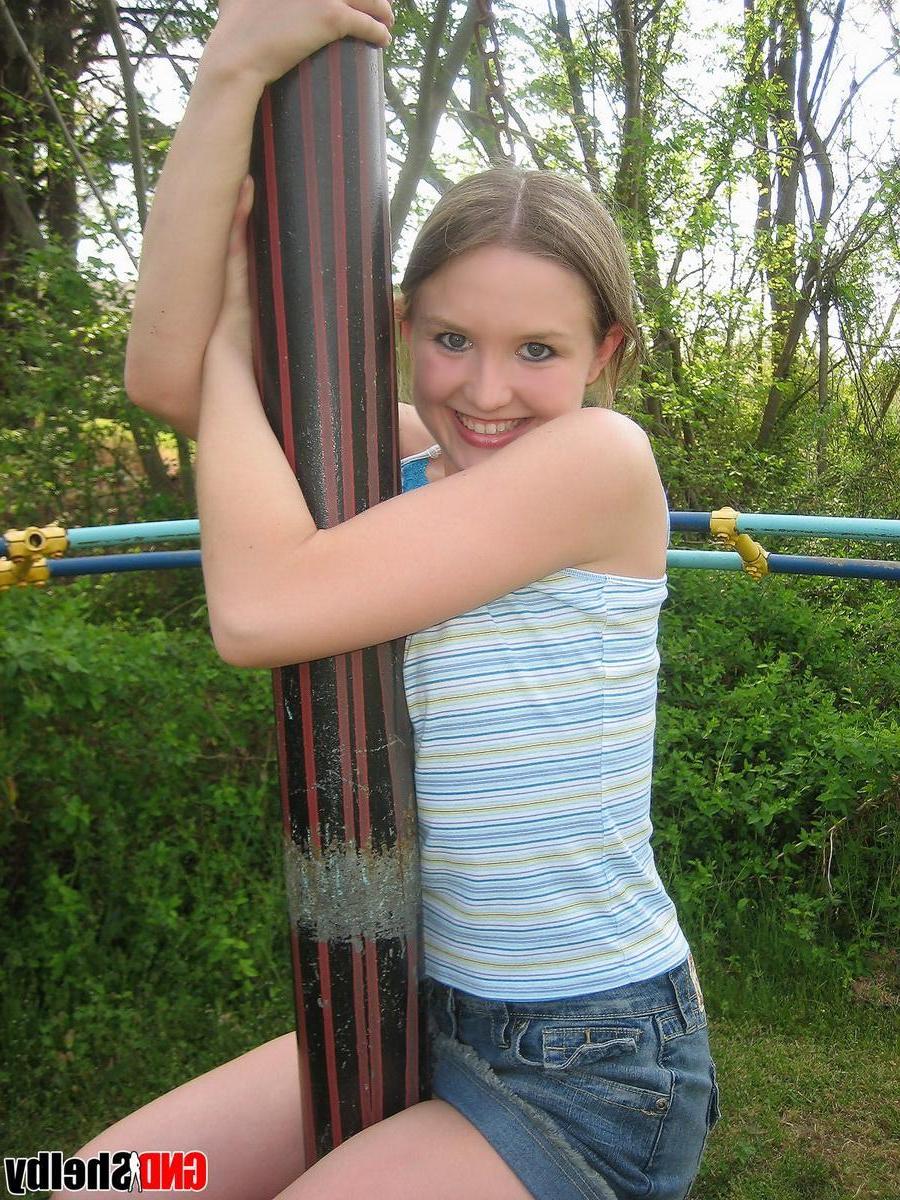 12P Perky girl next door Shelby shows off her perfect teenage breasts in the park on the jungle gym