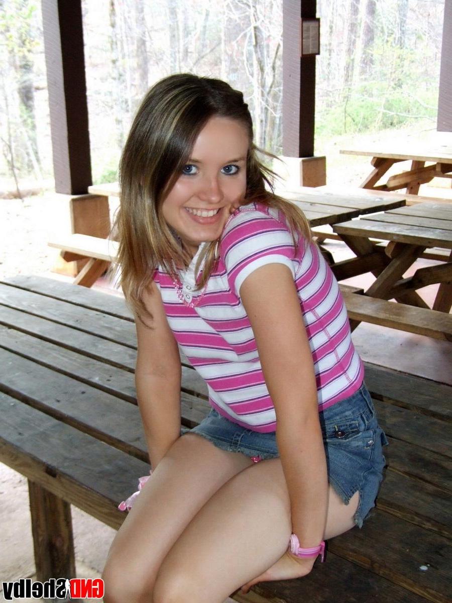 12P A horny Shelby loves to tease a she flashes her perky tits and tight teen pussy at the park