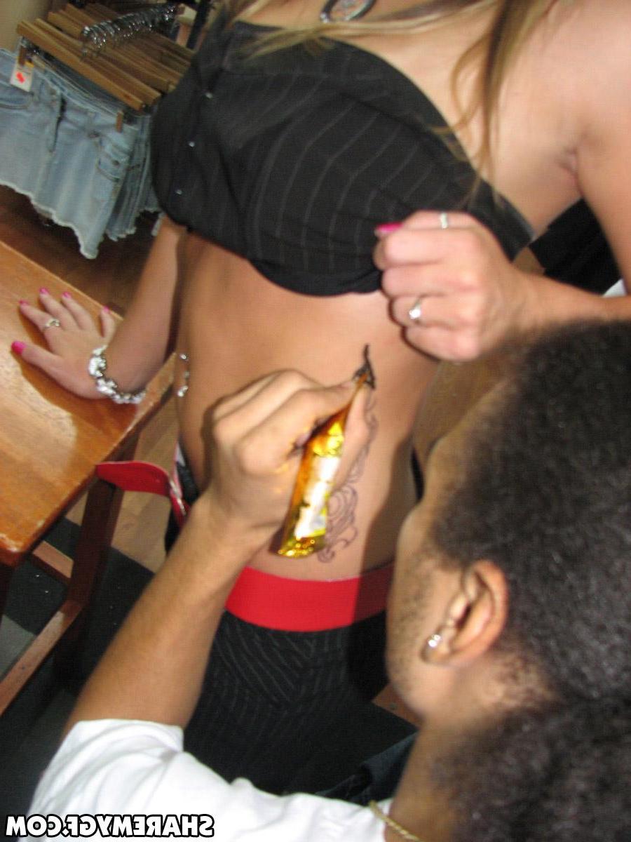 20P Hot coeds take some pictures while getting ink