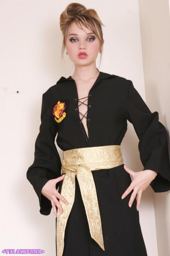 15P Pictures of teen girl Kristina Fey teasing from behind a trench coat