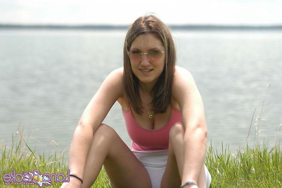 20P Pictures of teen chick Lana Brooke flashing her tits outside