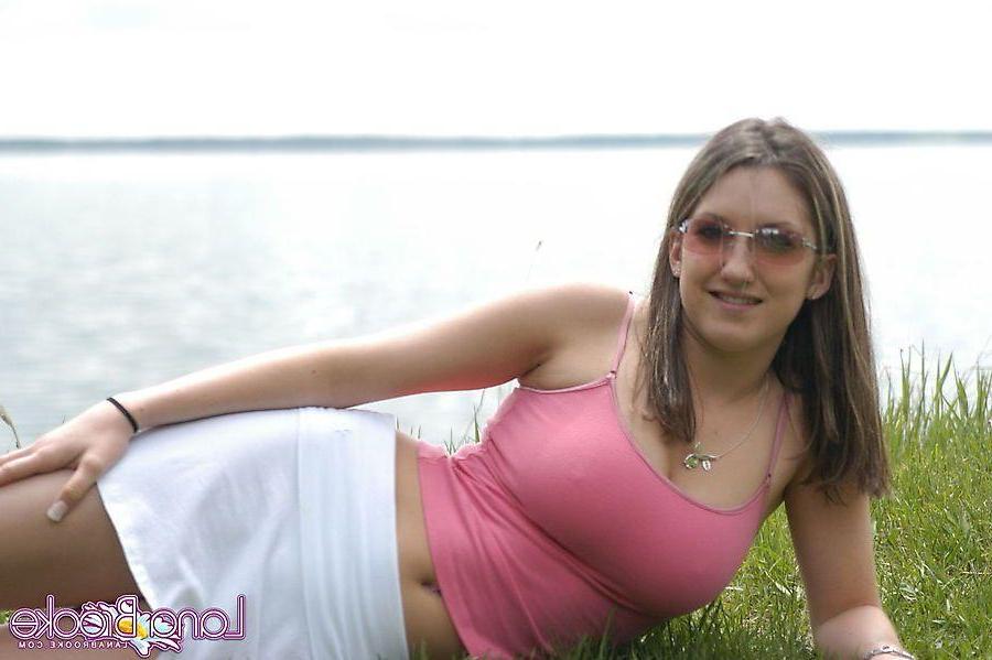 20P Pictures of teen chick Lana Brooke flashing her tits outside